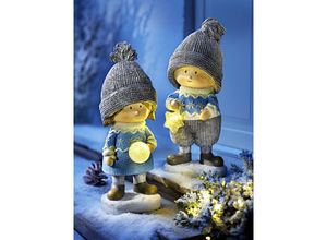 4026411700953 - Dekofigur Winterkind Alma mit LED-Kugel