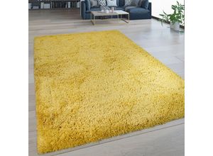 4061981064357 - Hochflor Teppich Wohnzimmer Waschbar Rutschfest Flokati Optik Einfarbig In Gelb 140x200 cm - Paco Home