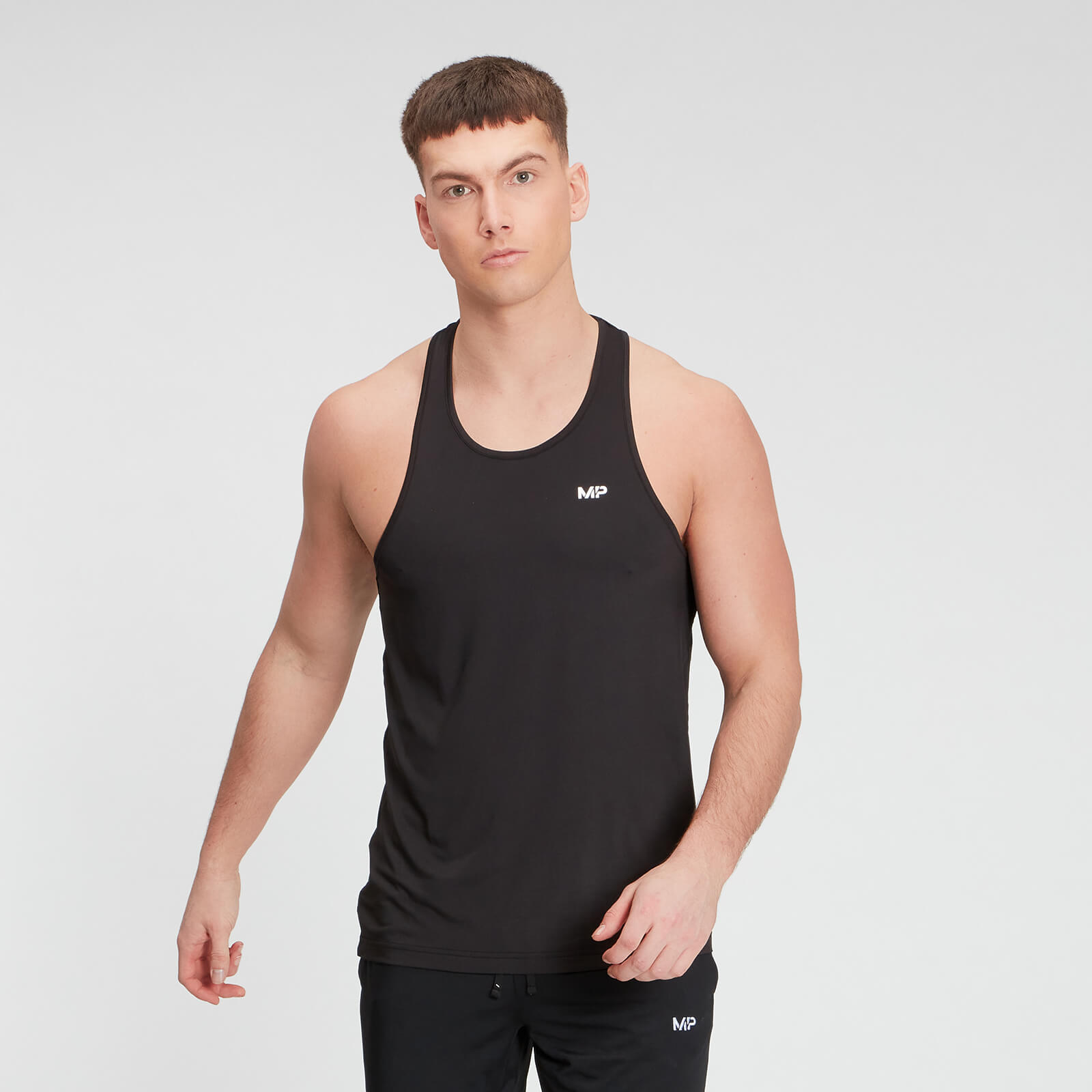 5056307364906 - Herren Essentials Training Stringer-Top - Schwarz - XS