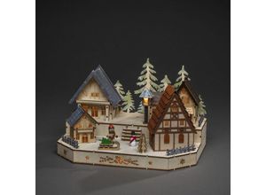 7318303235108 - Weihnachtsdorf KONSTSMIDE Weihnachtsdeko Weihnachtsdörfer Gr B H T 30 cm x 20 cm x 20 cm beige (naturfarben) Weihnachtskrippen Weihnachtsdörfer LED Holzsilhouette Dorf mit Schneemann Kind und Schlitten